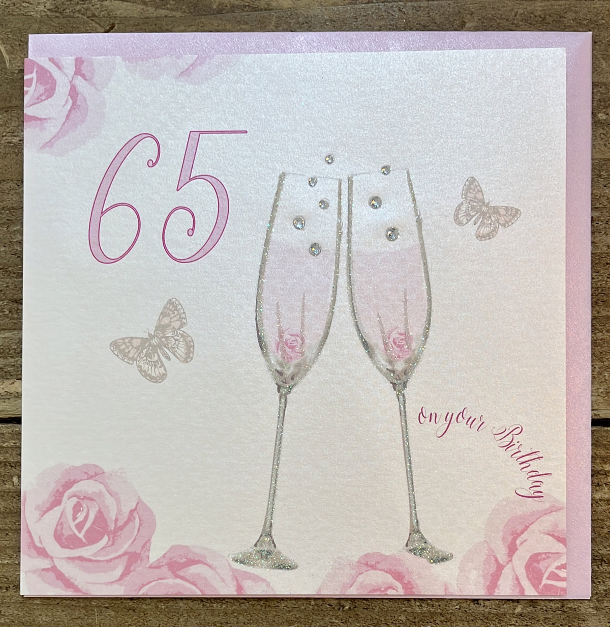 Age 65th Card: Champagne Flutes Hand Finished Crystals & Glitter - Pale Gold - White Cotton Cards