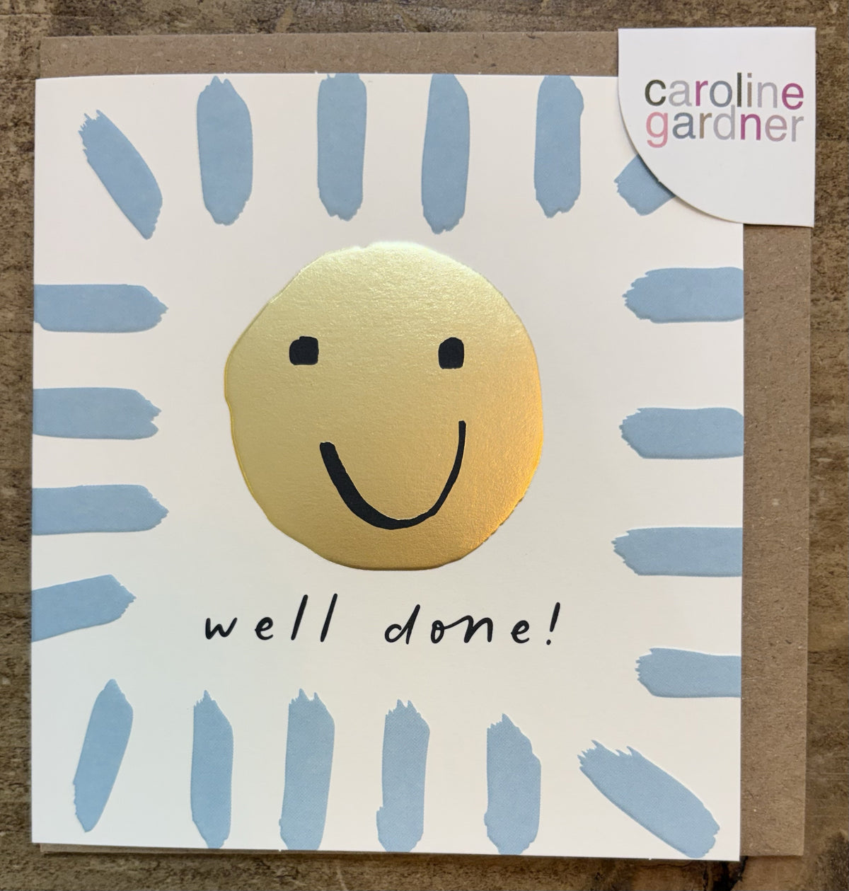 Well Done Card: GOLD FOIL Smiley Face With Brush Border Embossed - Caroline Gardner