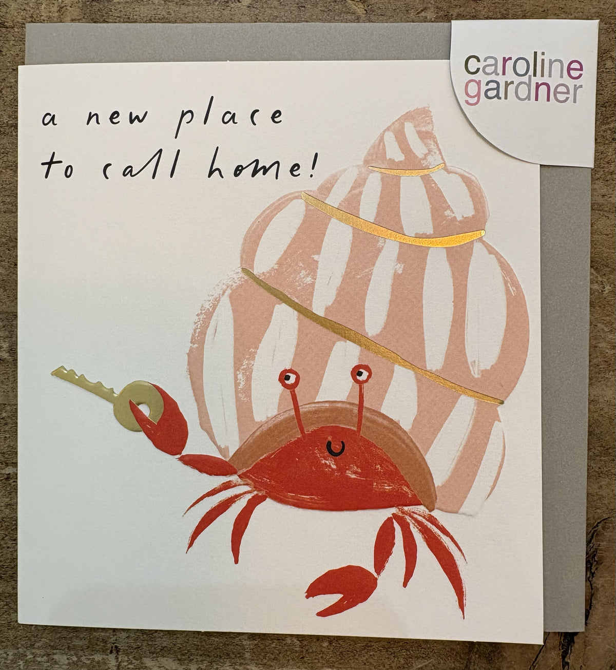 New Home Card: GOLD FOIL Place To Call Home Crab With Key Embossed - Caroline Gardner